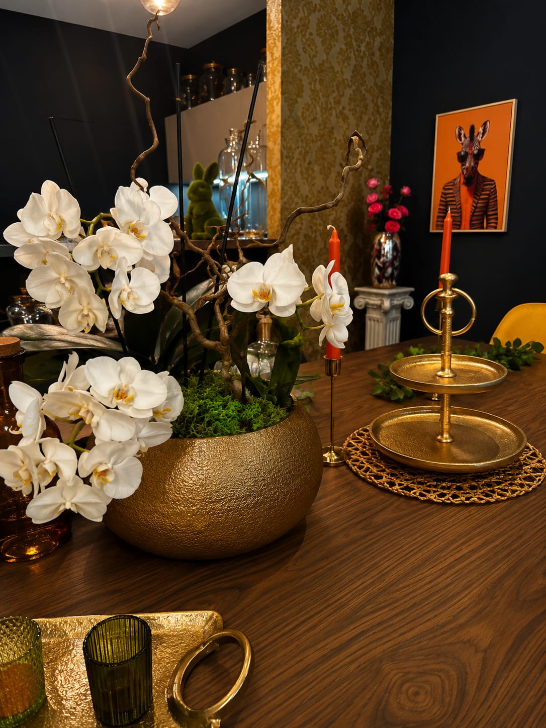 Orchids and golden details on the table
